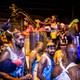 Splashing paint J’ouvert morning with Dirty Dozen. Photo Credit: UK Soca Scene